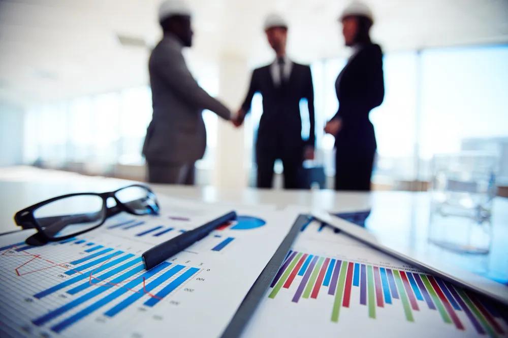 executives in a meeting representing strategic negotiation