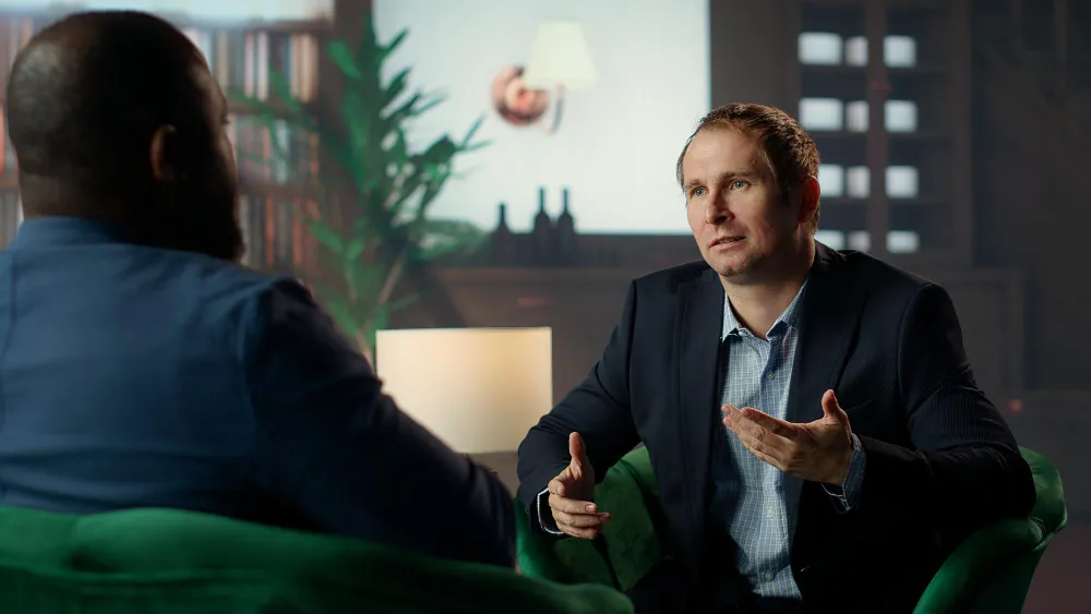 Two men in a disagreement representing seeking intellectual dissent as personal growth strategies